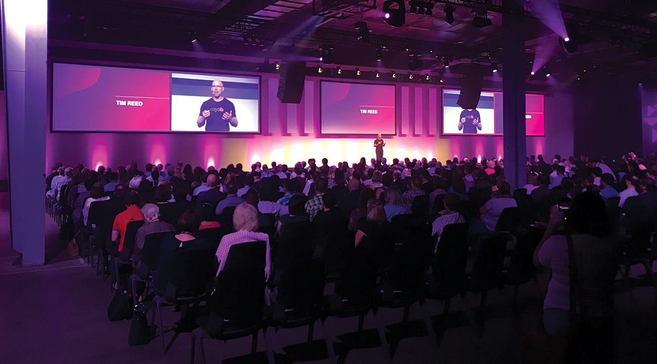 Conference held at The Venue Alexandria showing presenters and room set up.