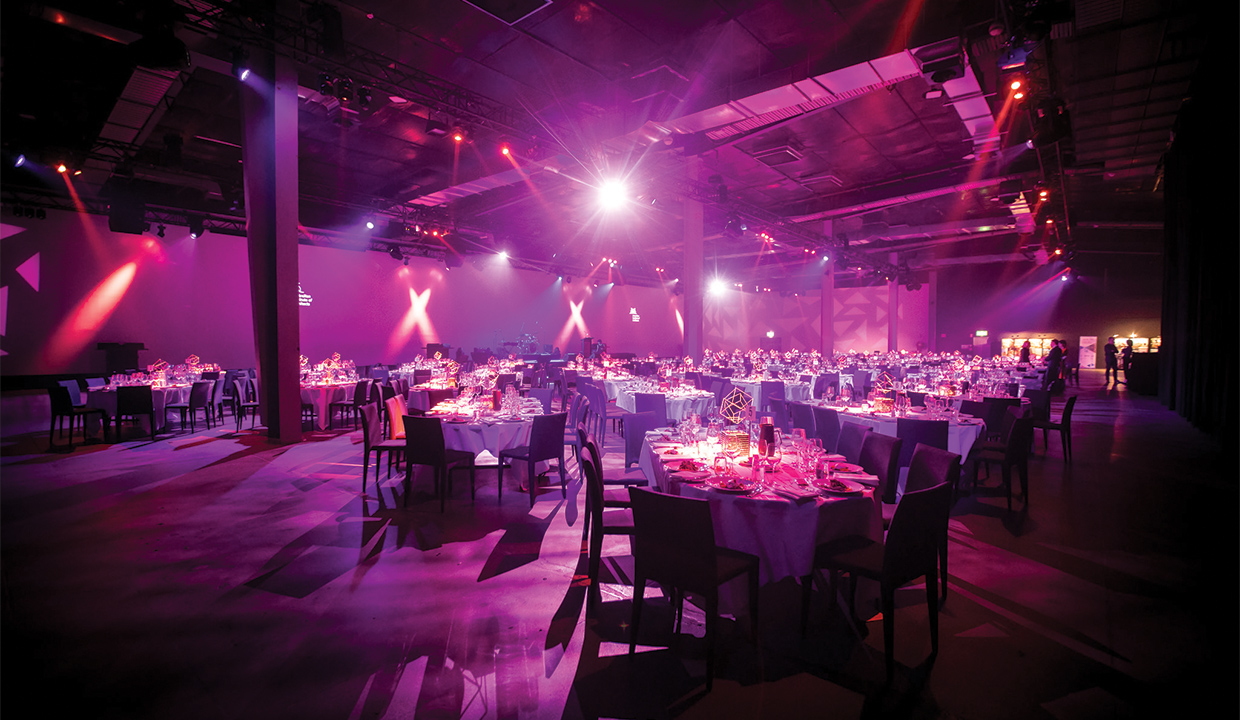 The Venue Alexandria set up with oval tables for a client gala dinner.